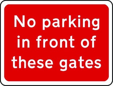 No parking in front of gates sign