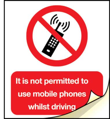 It is not permitted to use mobile phones whilst driving sign