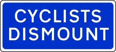 Cyclists dismount sign