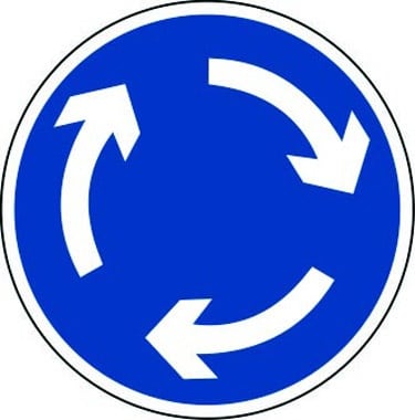 Roundabout sign with clockwise arrows