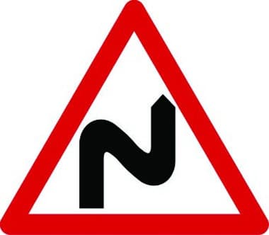 Double bends to the right traffic sign