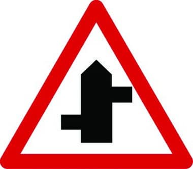 Staggered junction left first turn traffic sign