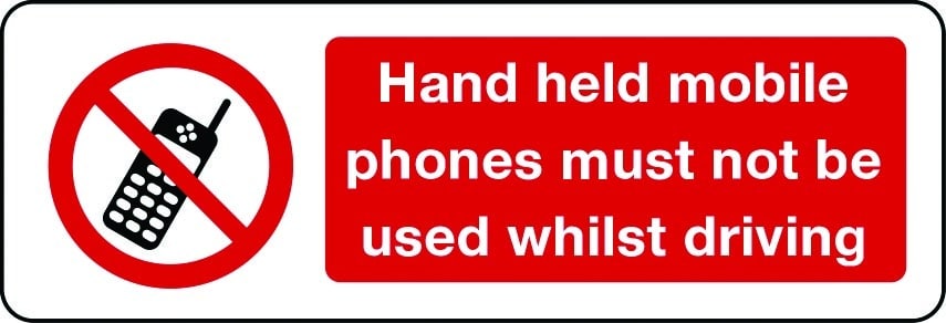 Hand held mobile phones must not be used whilst driving sign