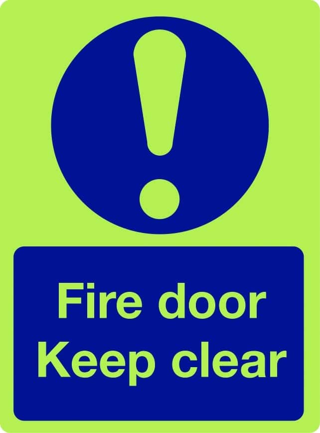 Fire door keep clear photoluminescent sign