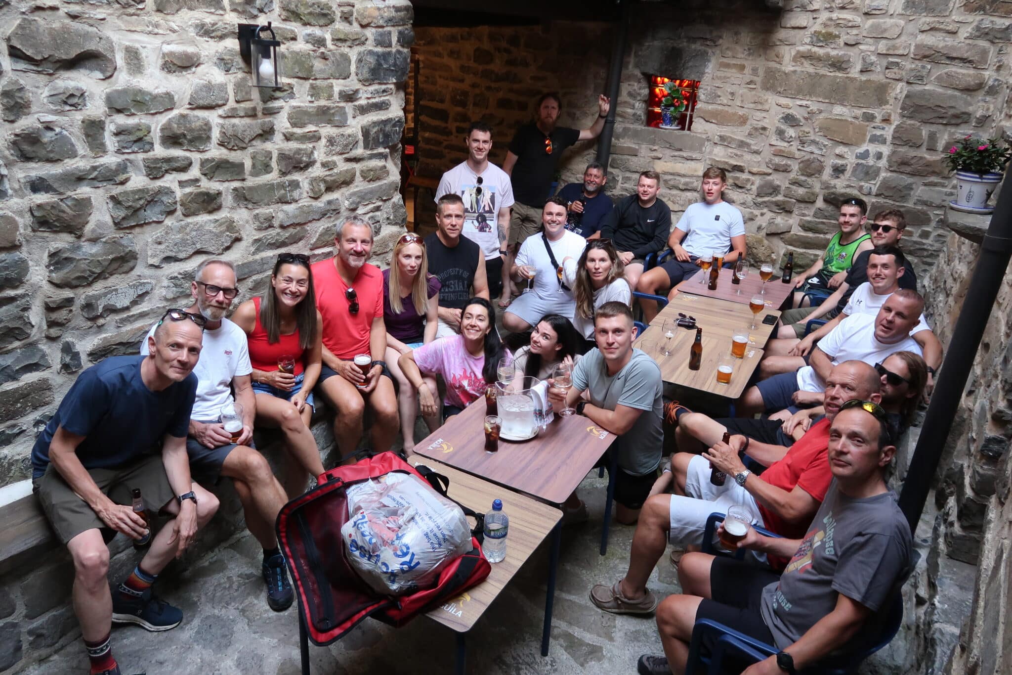 The team having drinks the night before the mountain