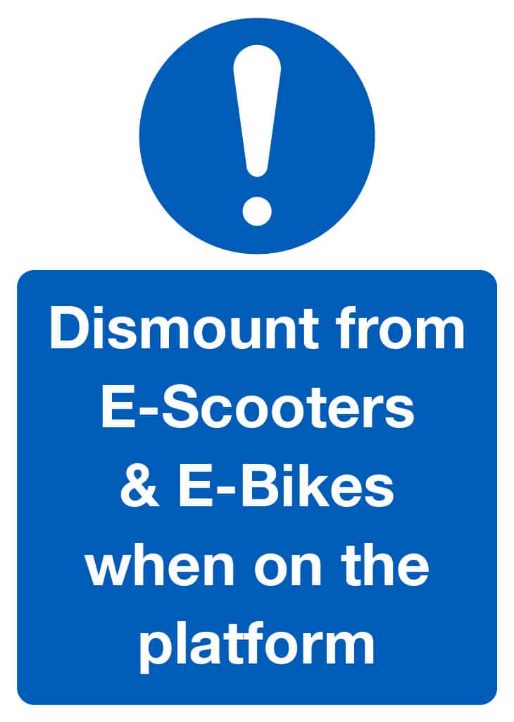 Dismount from E-Scooters & E-Bikes when on the platform